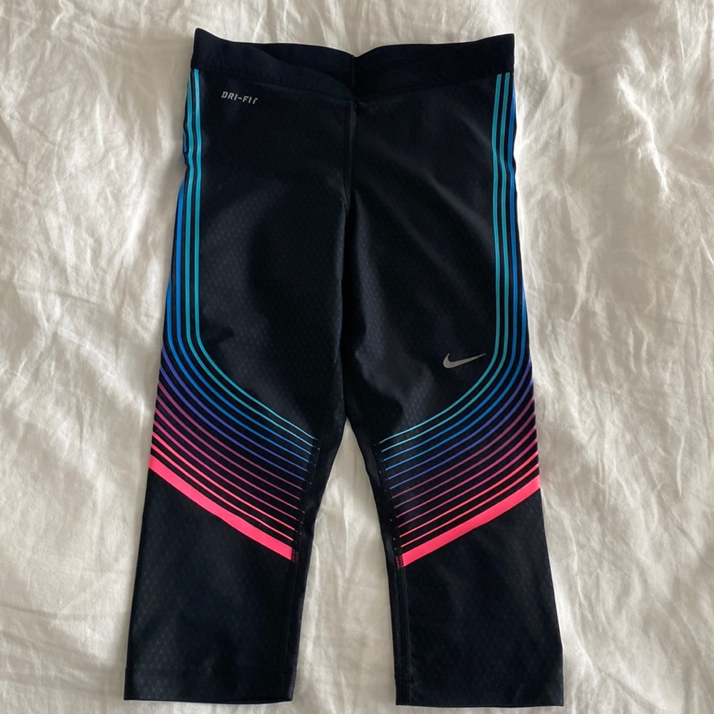 Nike Dri Fit knee length leggings. Good for biking.